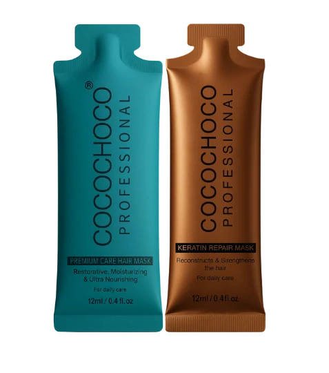 Δύο πακέτα μάσκας μαλλιών Cocochoco Professional, ένα μπλε και ένα καφέ, σε λευκό φόντο.
